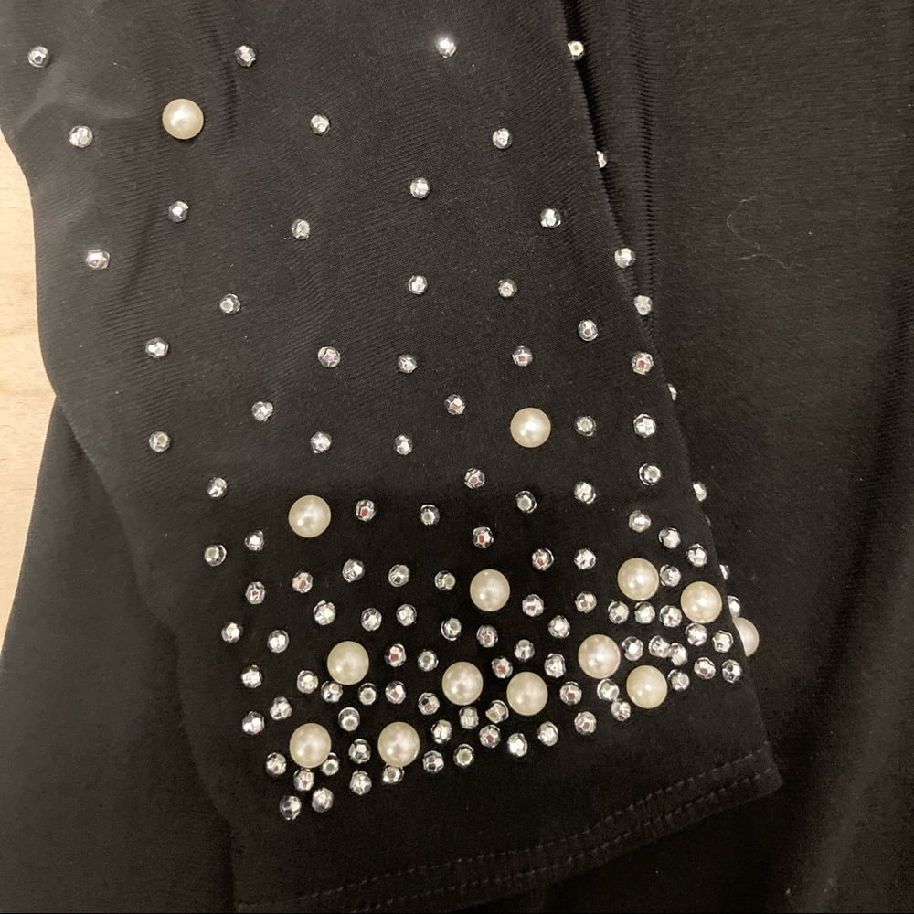 Black cocktail dress with rhinestones and pearls